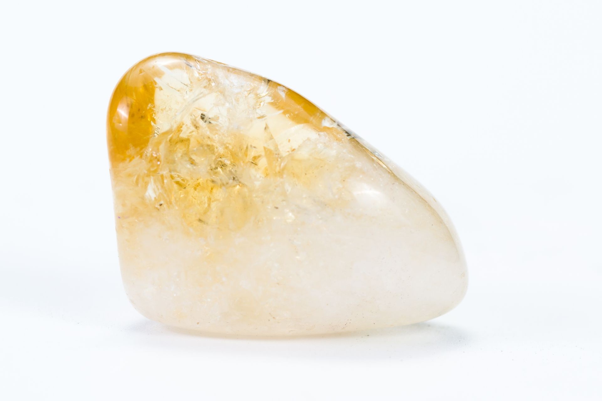 polished piece of citrine associated with the third chakra in metaphysical circles polished piece of citrine associated with the third chakra in metaphysical circles